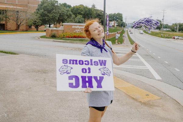 a person holding a sign